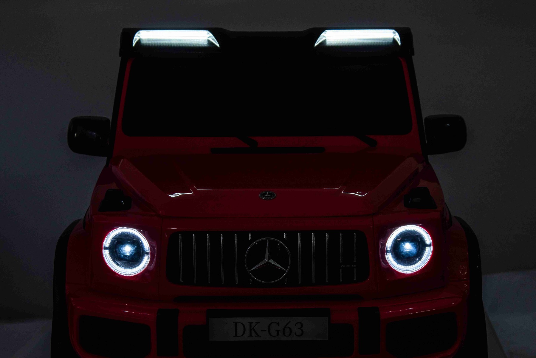Mașină electrică Mercedes-Benz G63 AMG 4x4 cu două locuri 12V, negru, MP3 Player cu intrare USB/AUX, tracțiune 4x4, baterie 12V14Ah, roți EVA cu suspensie, scaune din piele, telecomandă, licențiat - imagine 16