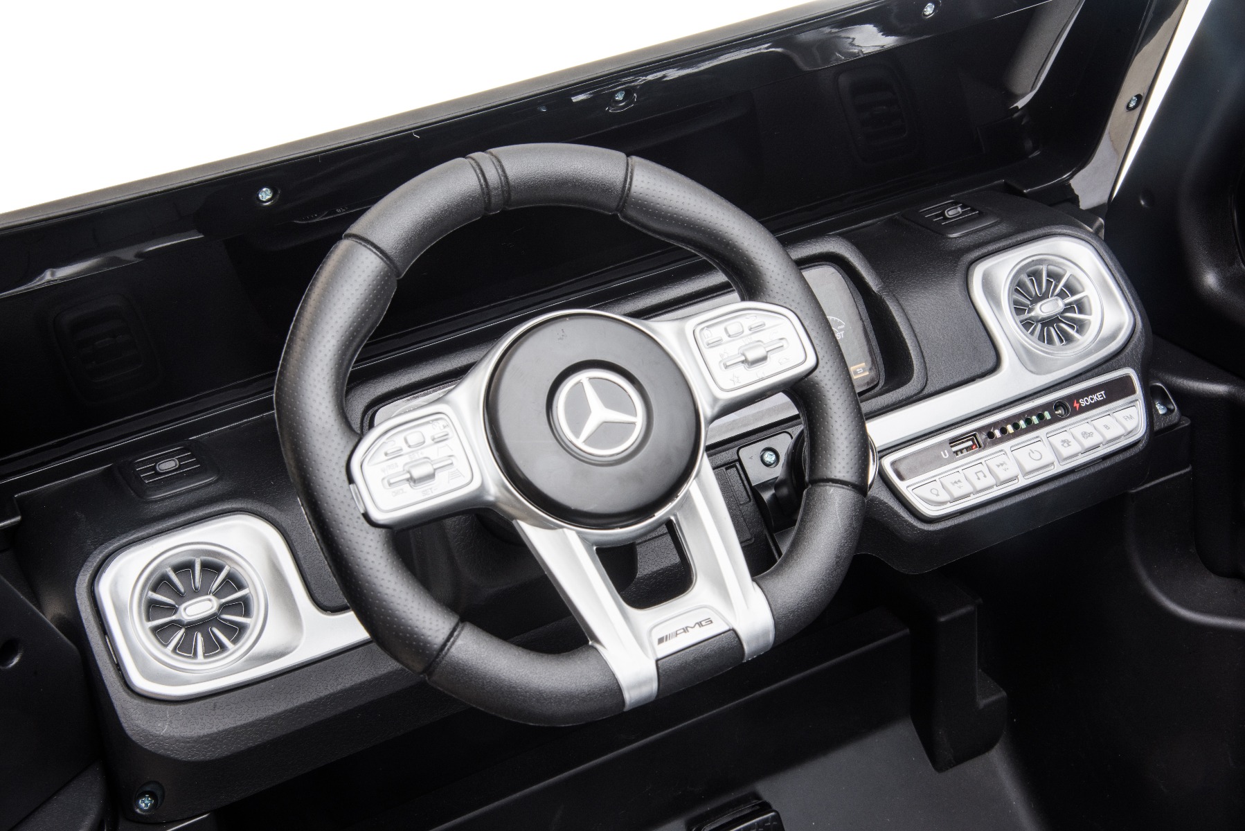 Mașină electrică de jucărie Mercedes-Benz G63 AMG 4x4 cu două locuri, negru, player MP3 cu conexiune USB/AUX și Bluetooth, tracțiune 4x4, baterie litiu, roți EVA cu suspensie, scaune din piele artificială, telecomandă, licență originală - imagine 6