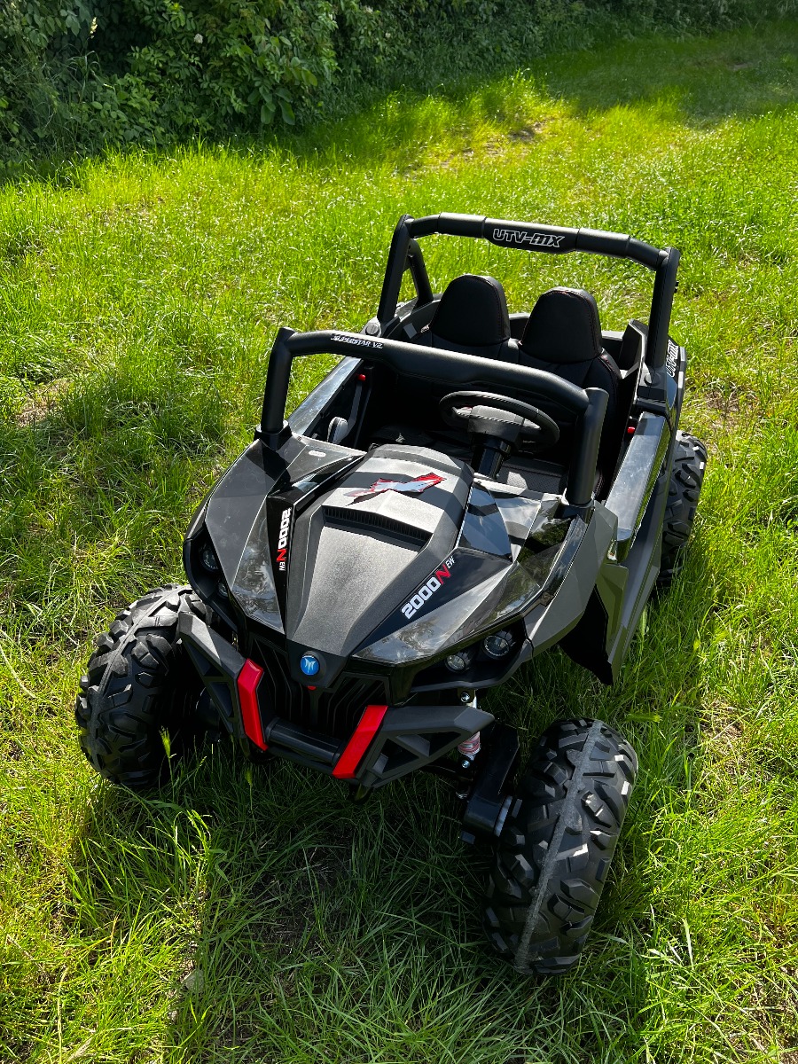 Mașinuță electrică de jucărie NEW RSX 24V, negru, tracțiune 4x4, baterie litiu, roți EVA, suspensii, scaun din piele artificială cu două locuri, telecomandă, player MP3 cu intrare USB/AUX - imagine 2