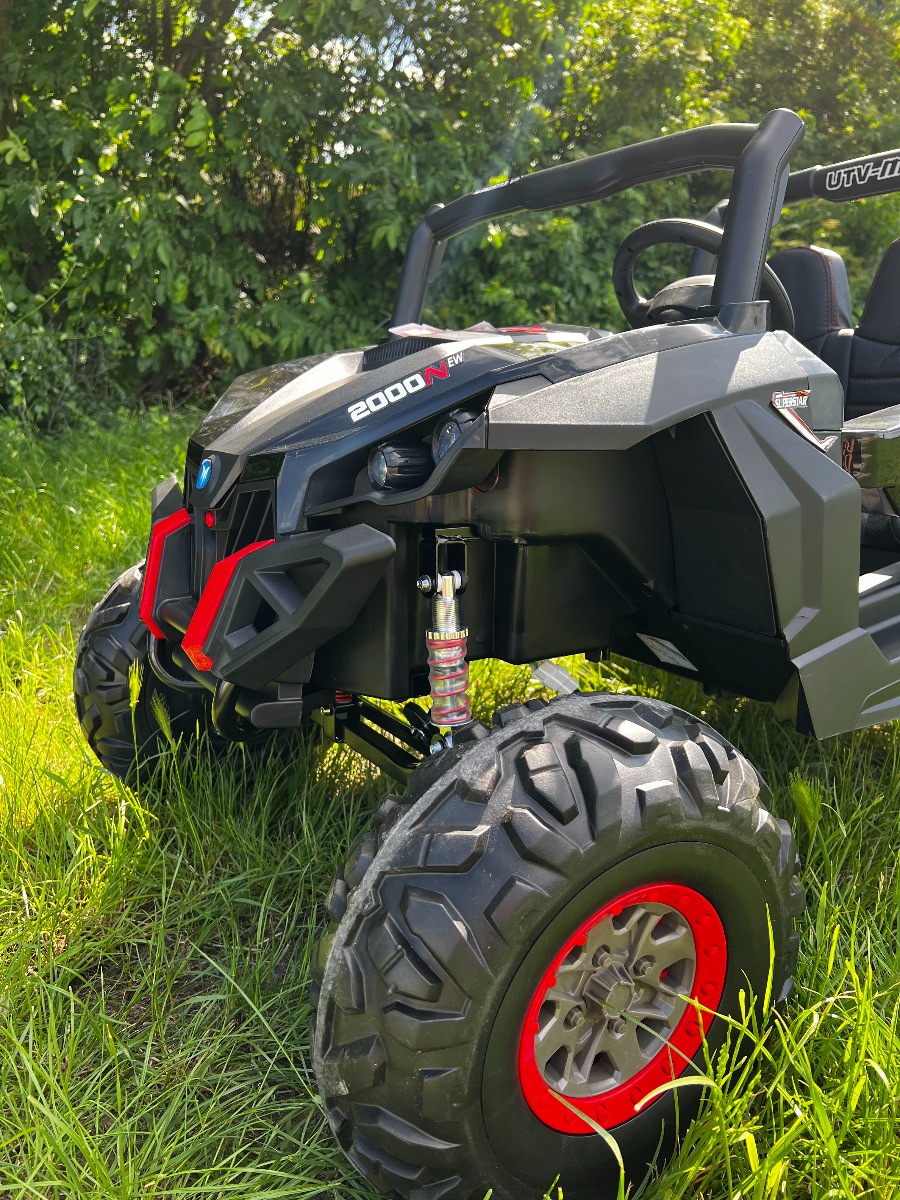 Mașinuță electrică de jucărie NEW RSX 24V, negru, tracțiune 4x4, baterie litiu, roți EVA, suspensii, scaun din piele artificială cu două locuri, telecomandă, player MP3 cu intrare USB/AUX - imagine 5