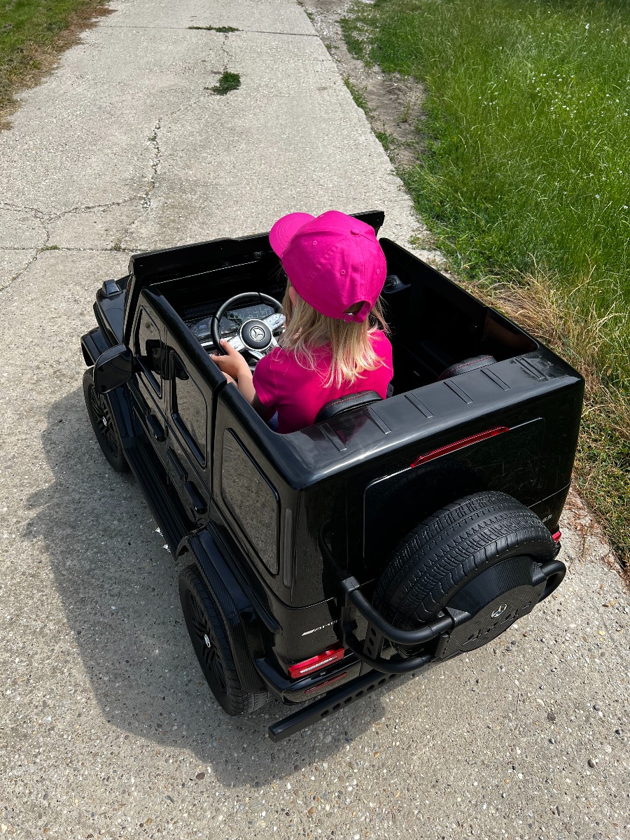Mașină electrică Mercedes-Benz G63 AMG 4x4 cu două locuri 12V, negru, MP3 Player cu intrare USB/AUX, tracțiune 4x4, baterie 12V14Ah, roți EVA cu suspensie, scaune din piele, telecomandă, licențiat - imagine 20