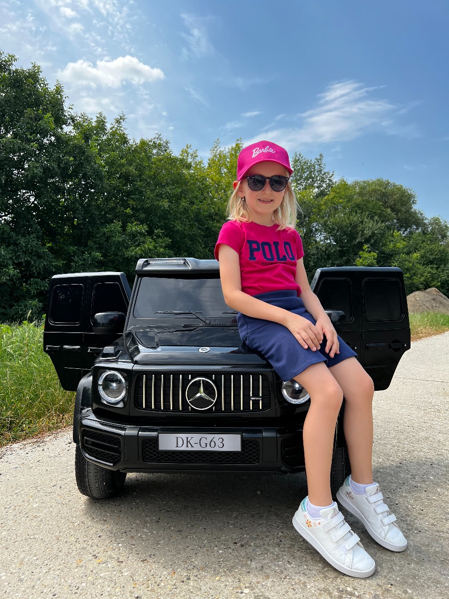 Mașină electrică Mercedes-Benz G63 AMG 4x4 cu două locuri 12V, negru, MP3 Player cu intrare USB/AUX, tracțiune 4x4, baterie 12V14Ah, roți EVA cu suspensie, scaune din piele, telecomandă, licențiat - imagine 22