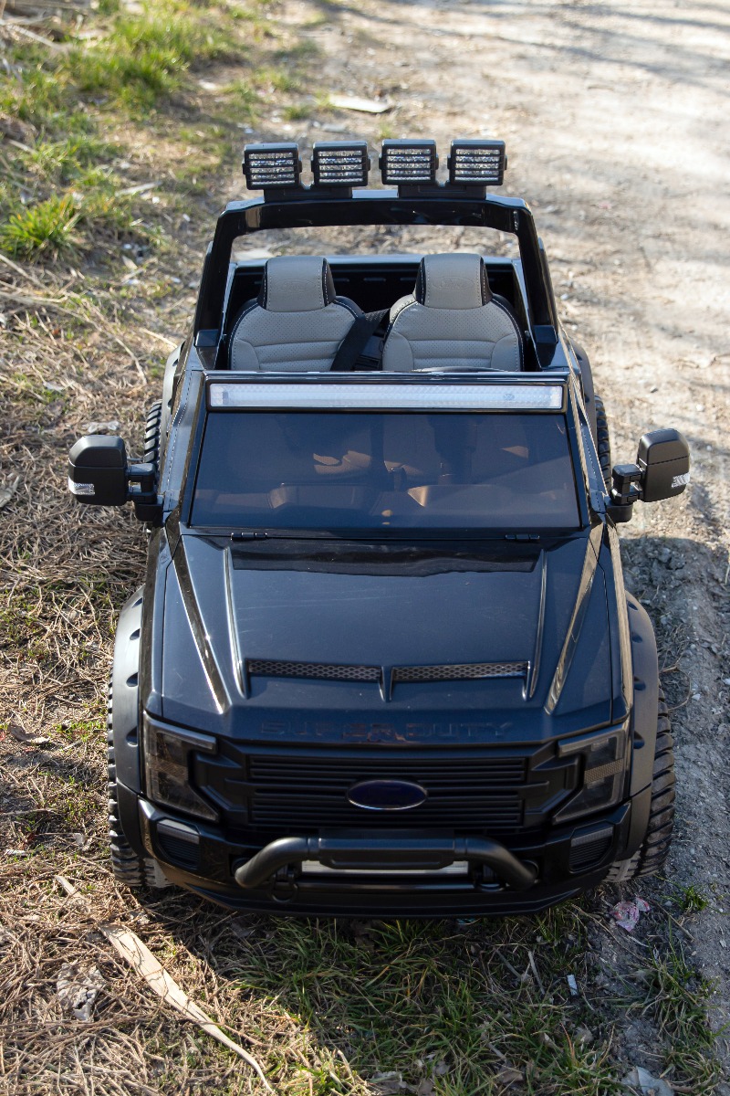 Mașină electrică pentru copii Ford Super Duty 24V negru, două locuri, tracțiune 4X4, motoare performante 24V, baterie portabilă, roți duble EVA spate, scaun din plastic, telecomandă 2,4 GHz, rampă lumină cu LED, MP3 player intrare USB, licență ORIGINALĂ - imagine 10