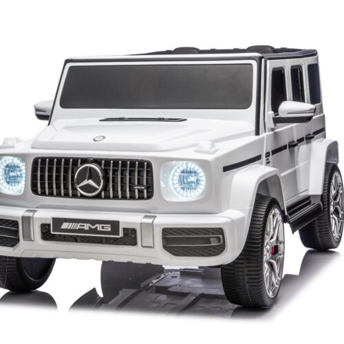 Mașină electrică de jucărie Mercedes-Benz G63 AMG 4×4 cu două locuri, alb, player MP3 cu conexiune USB/AUX și Bluetooth, tractiune 4×4, baterie litiu, roti EVA cu suspensie, scaune din piele artificială, telecomandă, licentă originală