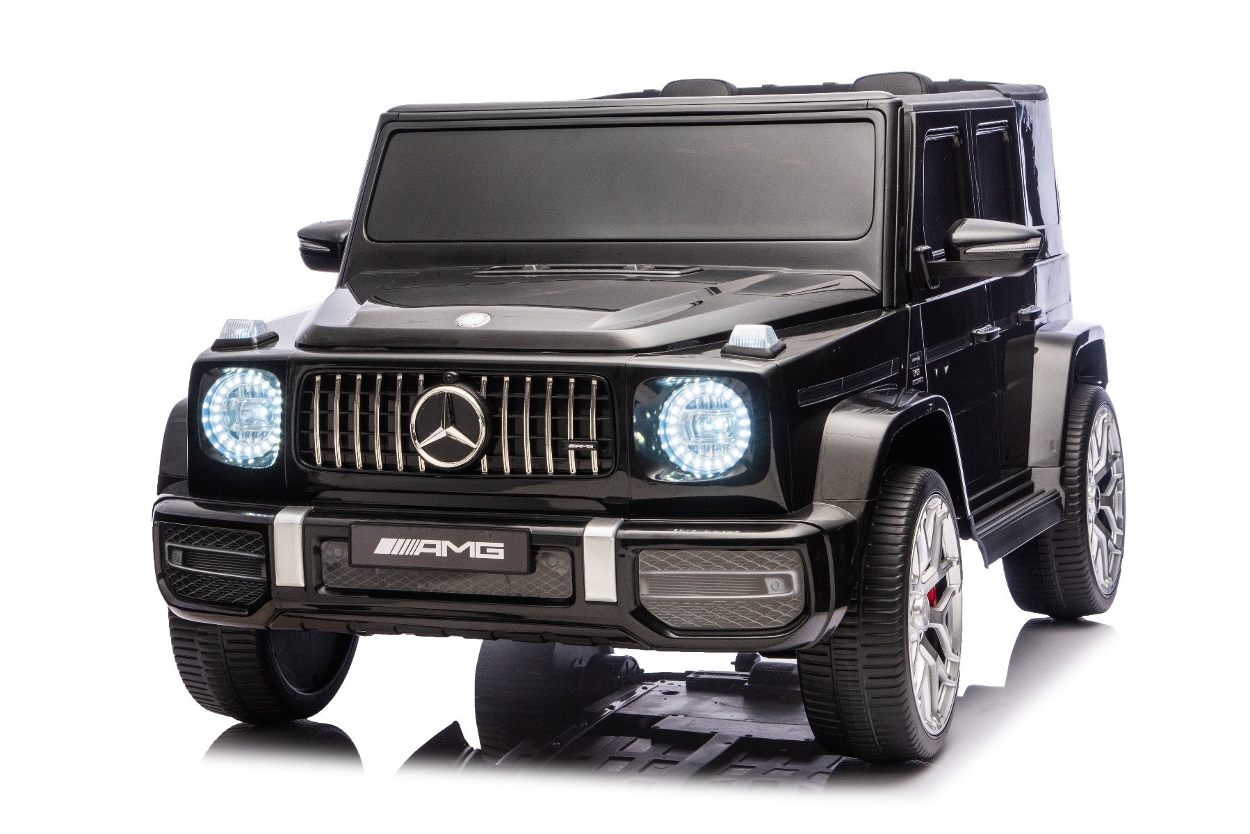 Mașină electrică de jucărie Mercedes-Benz G63 AMG 4x4 cu două locuri, negru, player MP3 cu conexiune USB/AUX și Bluetooth, tracțiune 4x4, baterie litiu, roți EVA cu suspensie, scaune din piele artificială, telecomandă, licență originală - imagine 4