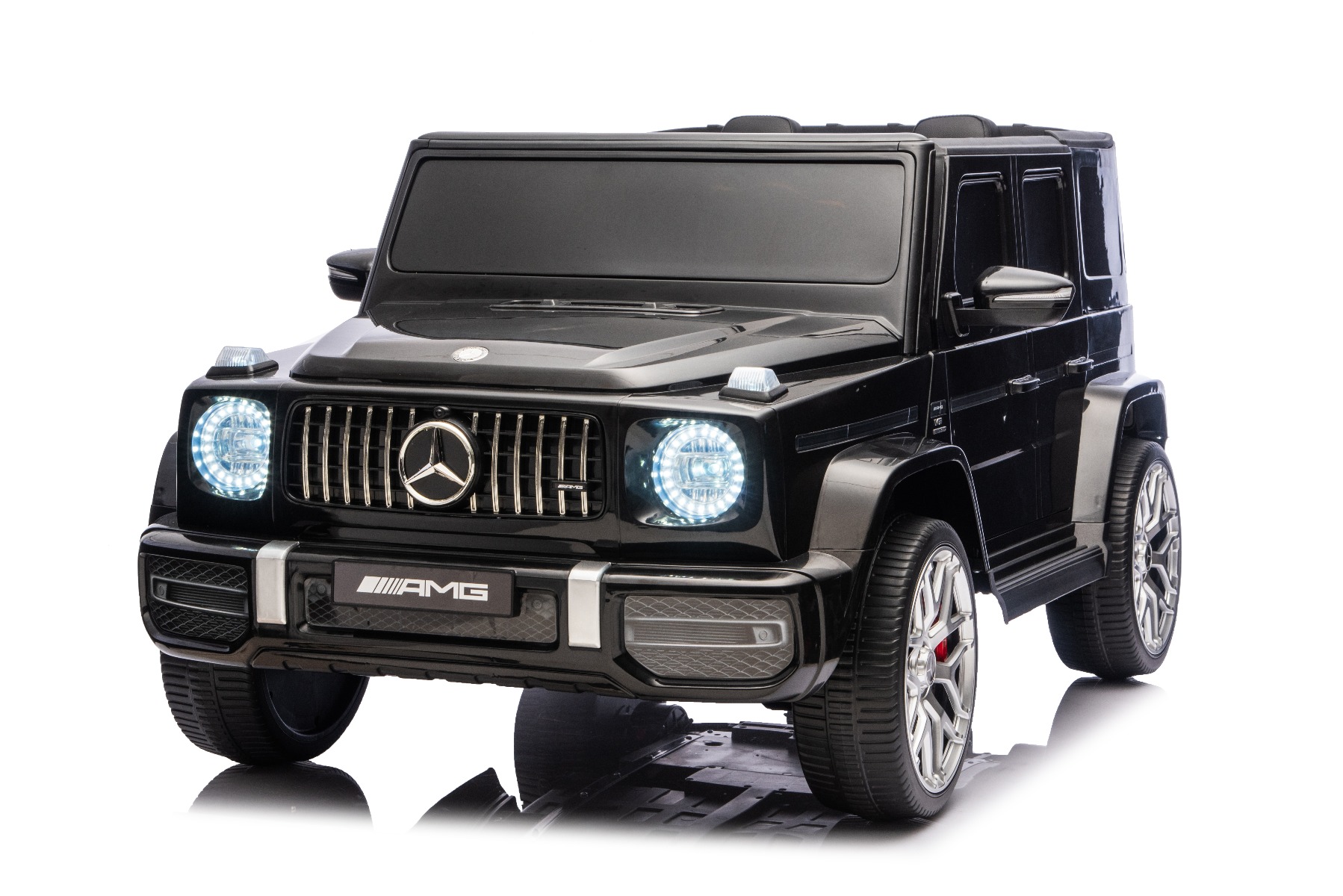 Mașină electrică de jucărie Mercedes-Benz G63 AMG 4x4 cu două locuri, negru, player MP3 cu conexiune USB/AUX și Bluetooth, tracțiune 4x4, baterie litiu, roți EVA cu suspensie, scaune din piele artificială, telecomandă, licență originală - imagine 5