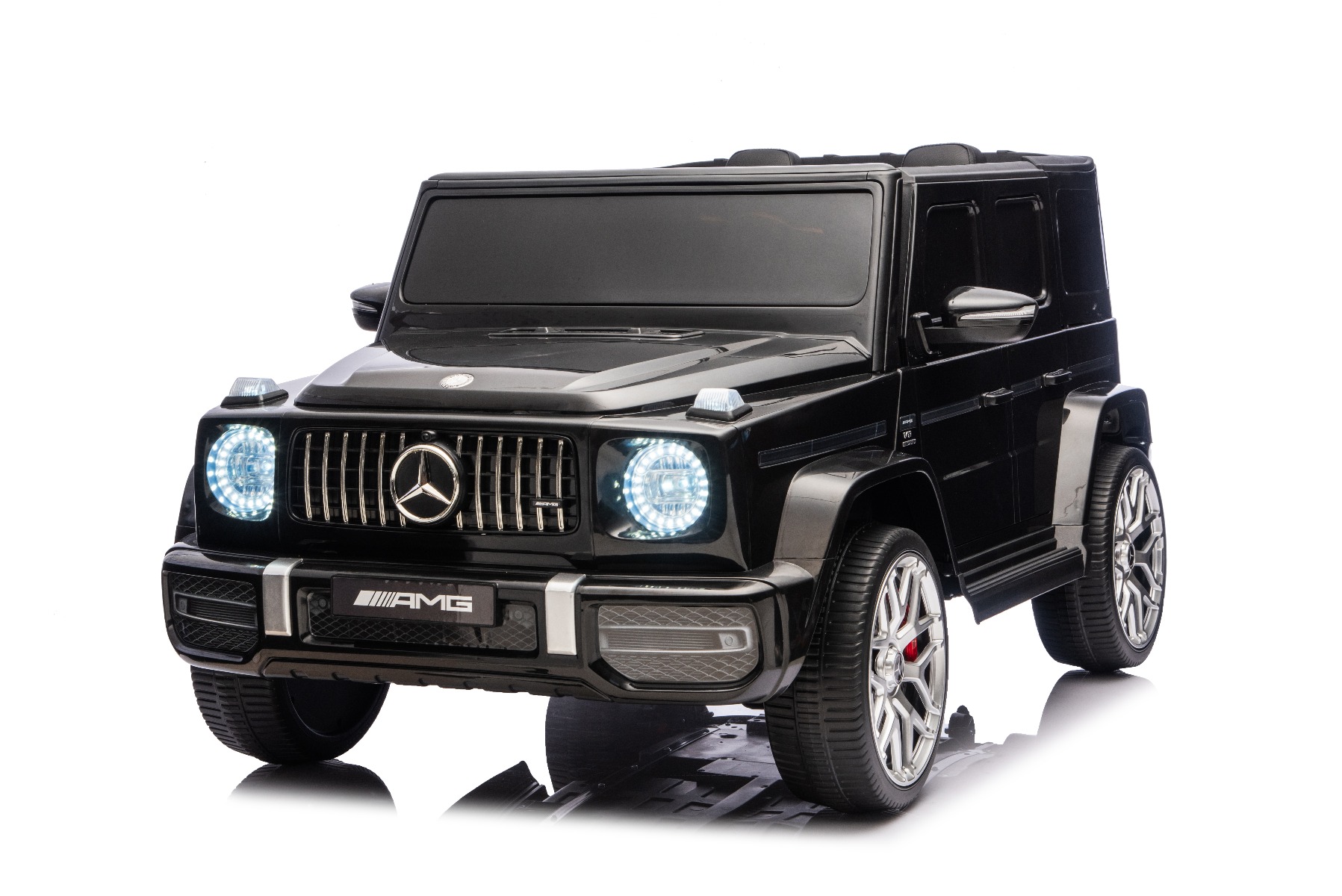 Mașină electrică de jucărie Mercedes-Benz G63 AMG 4x4 cu două locuri, negru, player MP3 cu conexiune USB/AUX și Bluetooth, tracțiune 4x4, baterie litiu, roți EVA cu suspensie, scaune din piele artificială, telecomandă, licență originală - imagine 8