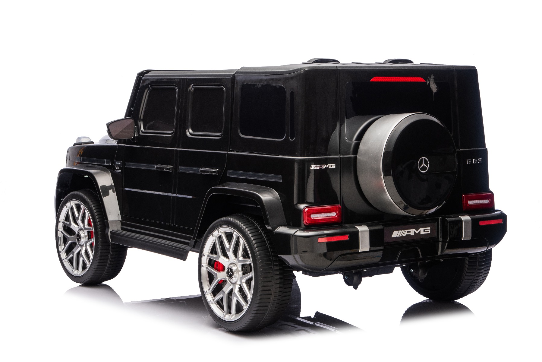 Mașină electrică de jucărie Mercedes-Benz G63 AMG 4x4 cu două locuri, negru, player MP3 cu conexiune USB/AUX și Bluetooth, tracțiune 4x4, baterie litiu, roți EVA cu suspensie, scaune din piele artificială, telecomandă, licență originală - imagine 12