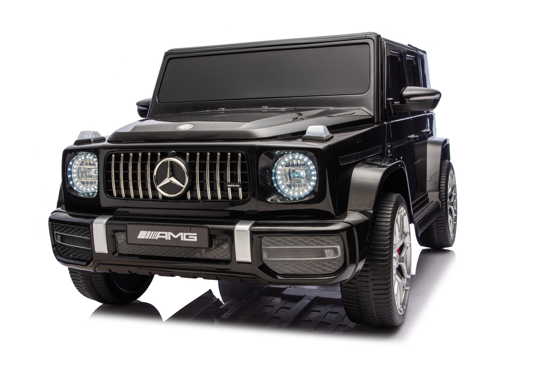 Mașină electrică de jucărie Mercedes-Benz G63 AMG 4x4 cu două locuri, negru, player MP3 cu conexiune USB/AUX și Bluetooth, tracțiune 4x4, baterie litiu, roți EVA cu suspensie, scaune din piele artificială, telecomandă, licență originală - imagine 33